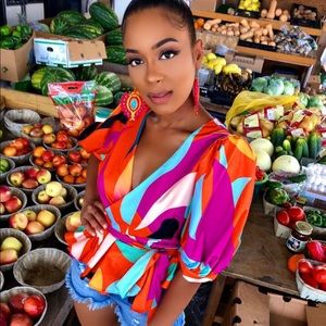 ARIO PEPLUM WRAP BLOUSE